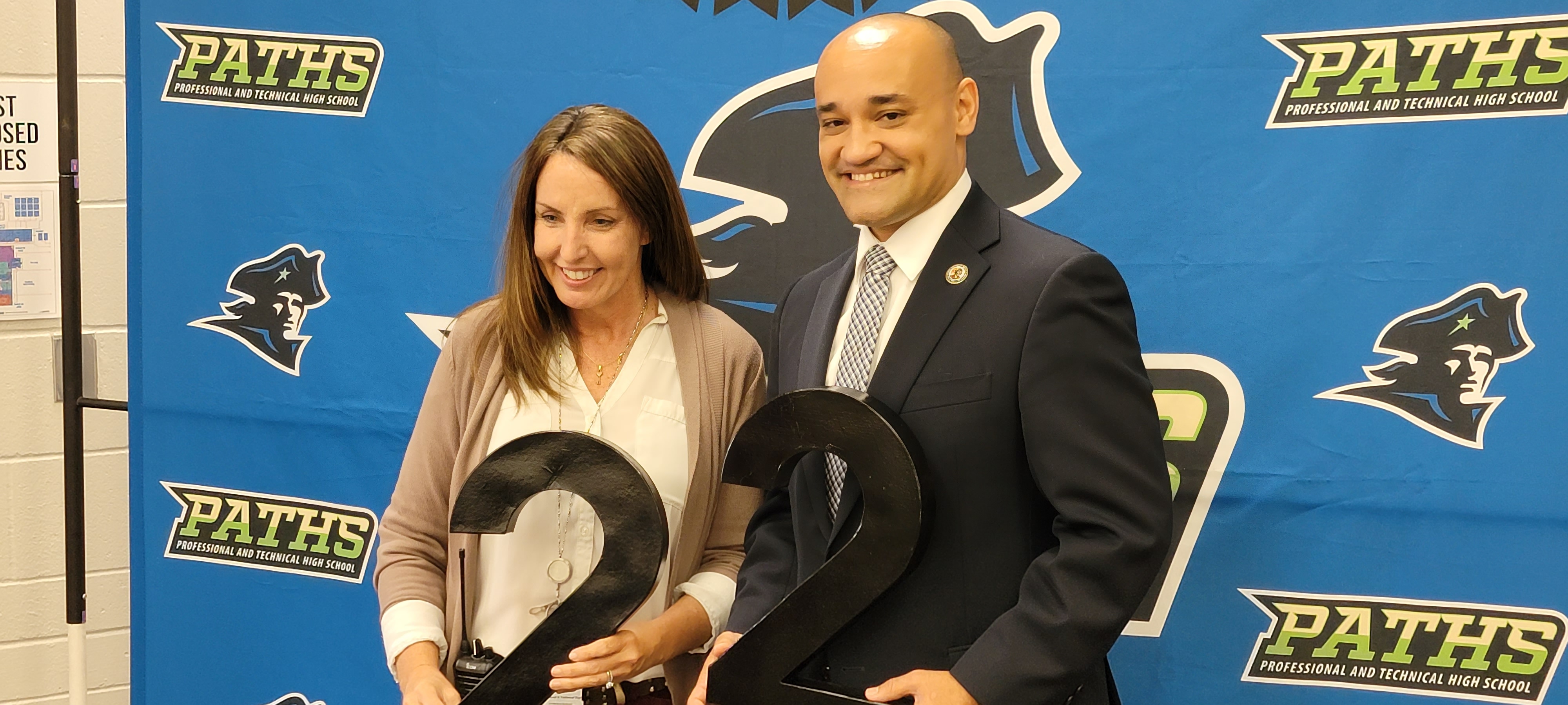 Julius speaking with community members